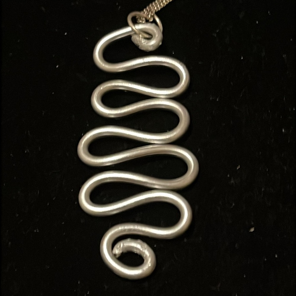 Elegant Silver Wave Hand Design Necklace - Picture 15 of 17
